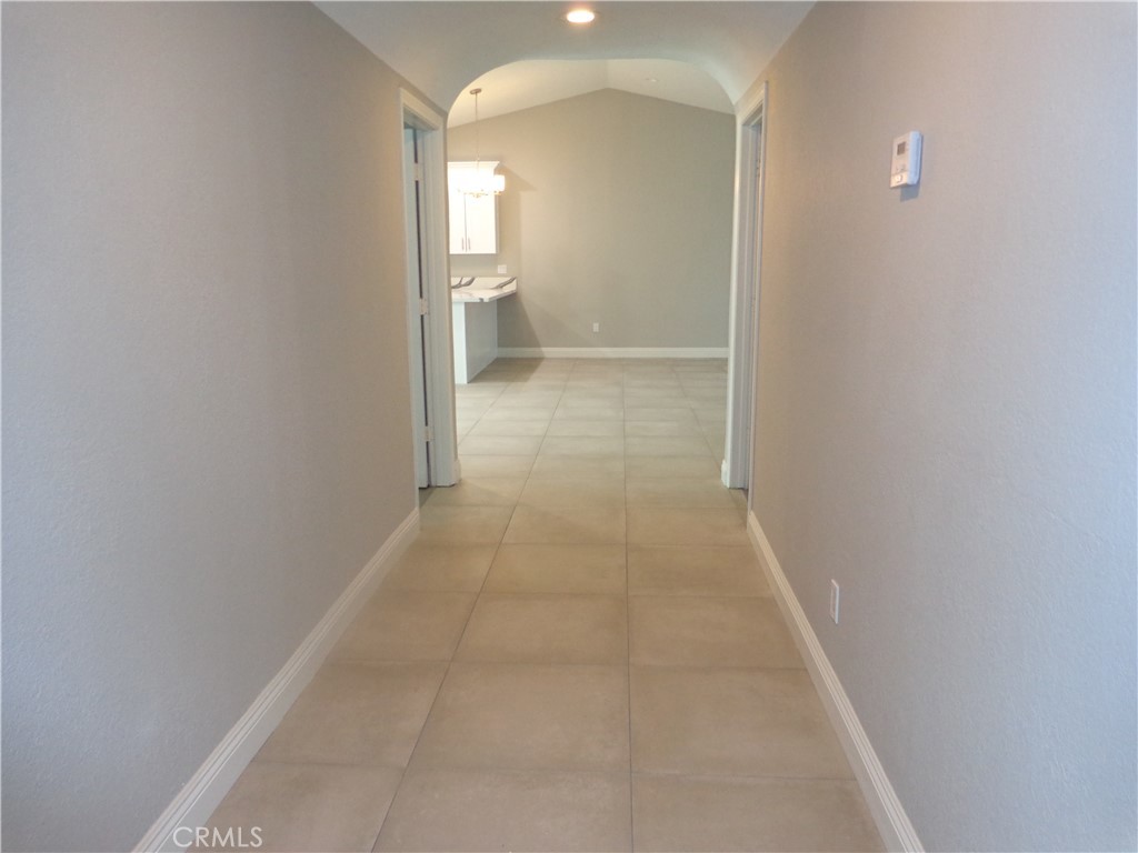 12744 Running Deer Road Apple Valley, CA 92308 - Photo 16 of 30 a view of a room with an empty space and window