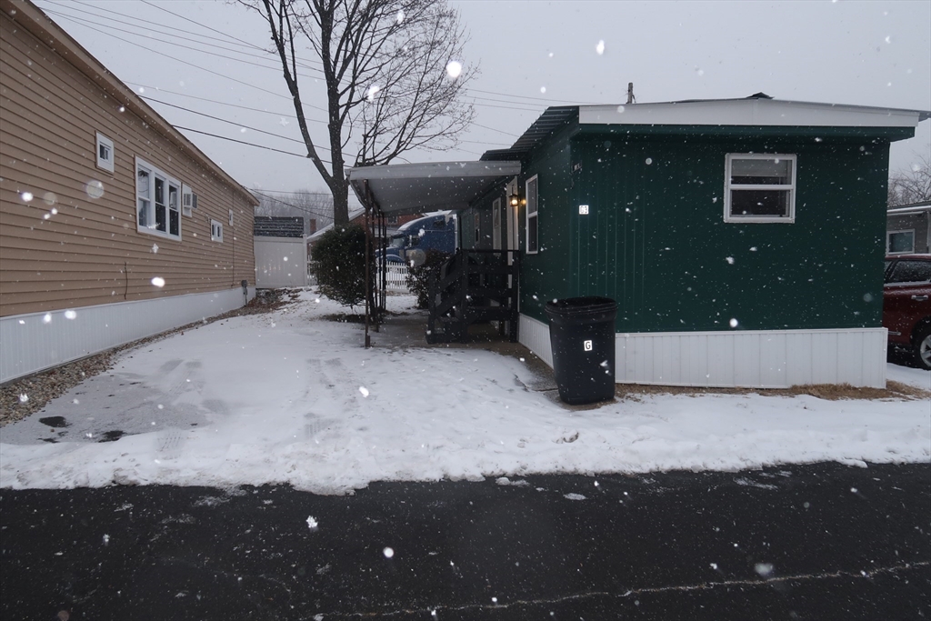 229 Miller Street, Unit G3 Ludlow, MA 01056 - Photo 2 of 12 a view of a house with a snow