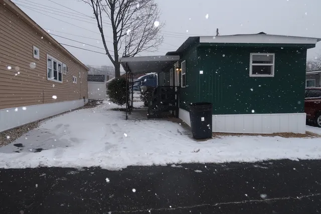 a view of a house with a snow