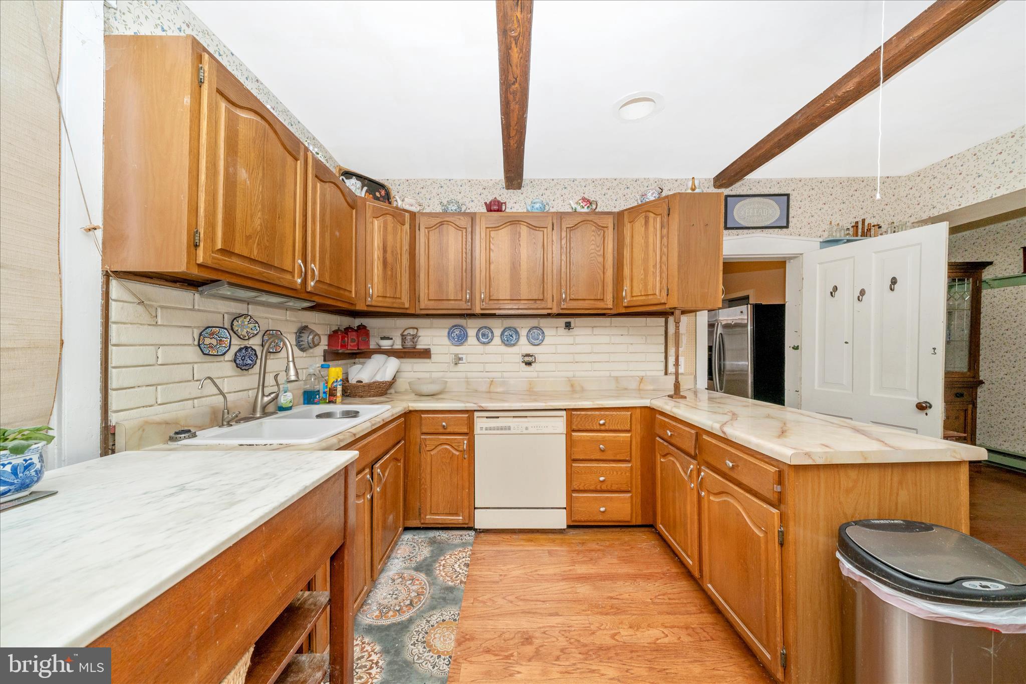 6710 Ford Road Frederick, MD 21702 - Photo 16 of 62 a kitchen with stainless steel appliances granite countertop a sink stove and refrigerator