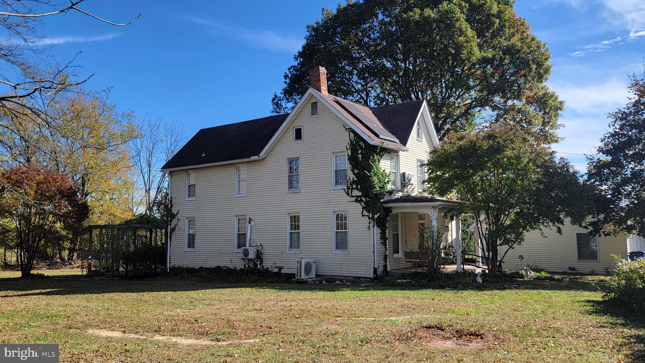 6710 Ford Road Frederick, MD 21702 - Photo 2 of 2 a front view of a house with a yard