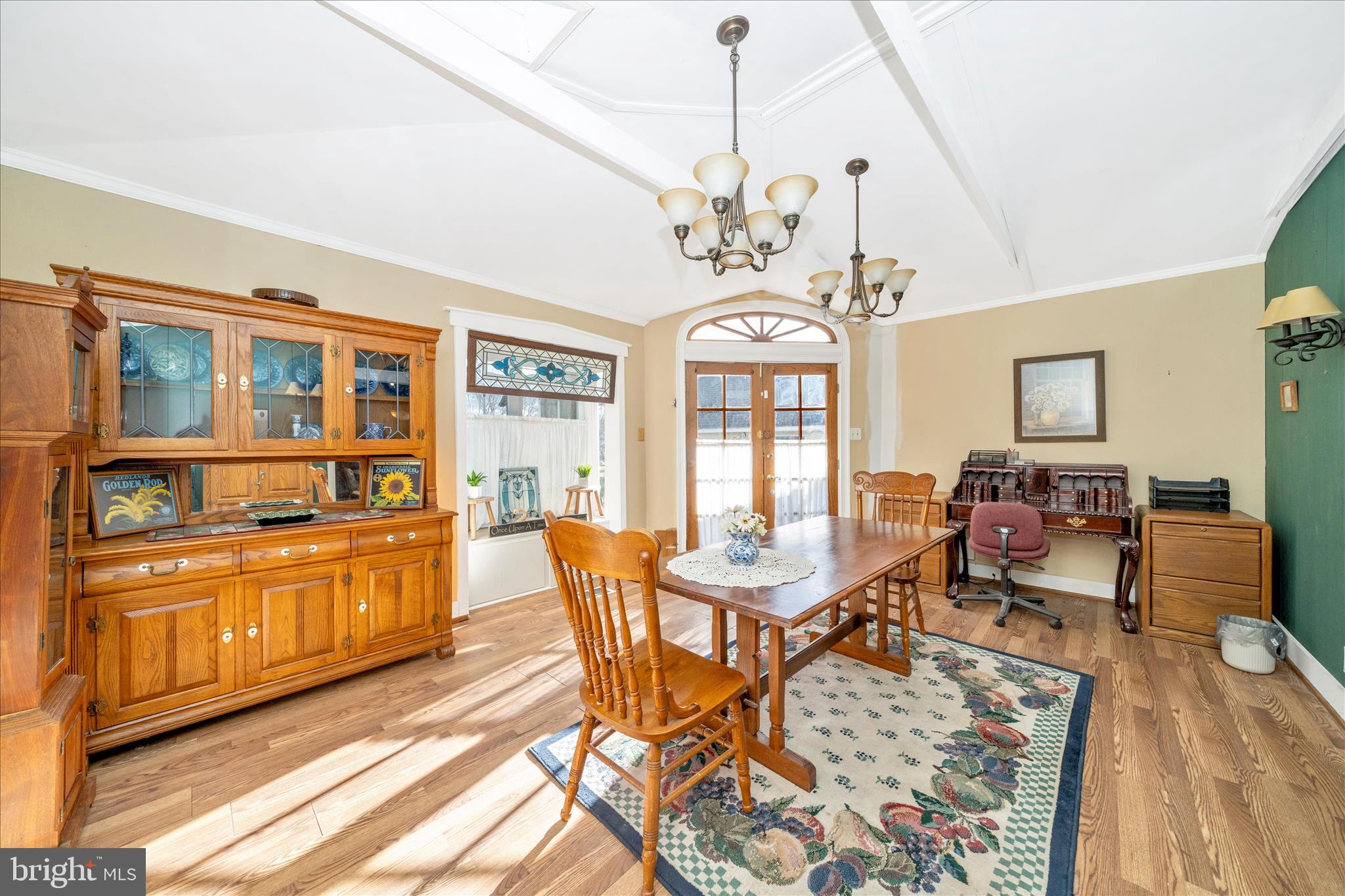 6710 Ford Road Frederick, MD 21702 - Photo 26 of 62 a view of a dining room with furniture a chandelier and wooden floor