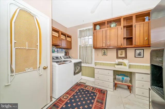 a bedroom with a bed and ceiling fan