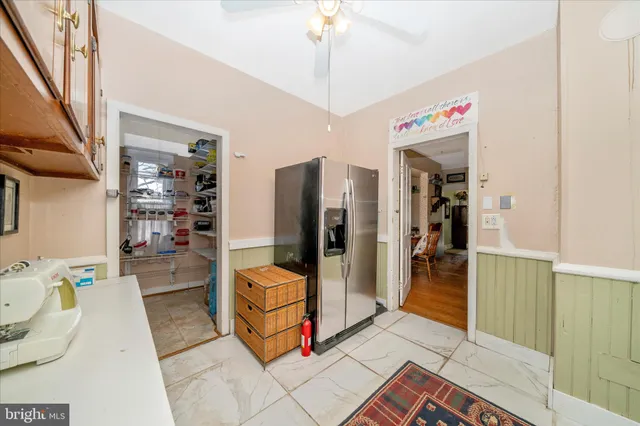 a view of an empty room with a large window