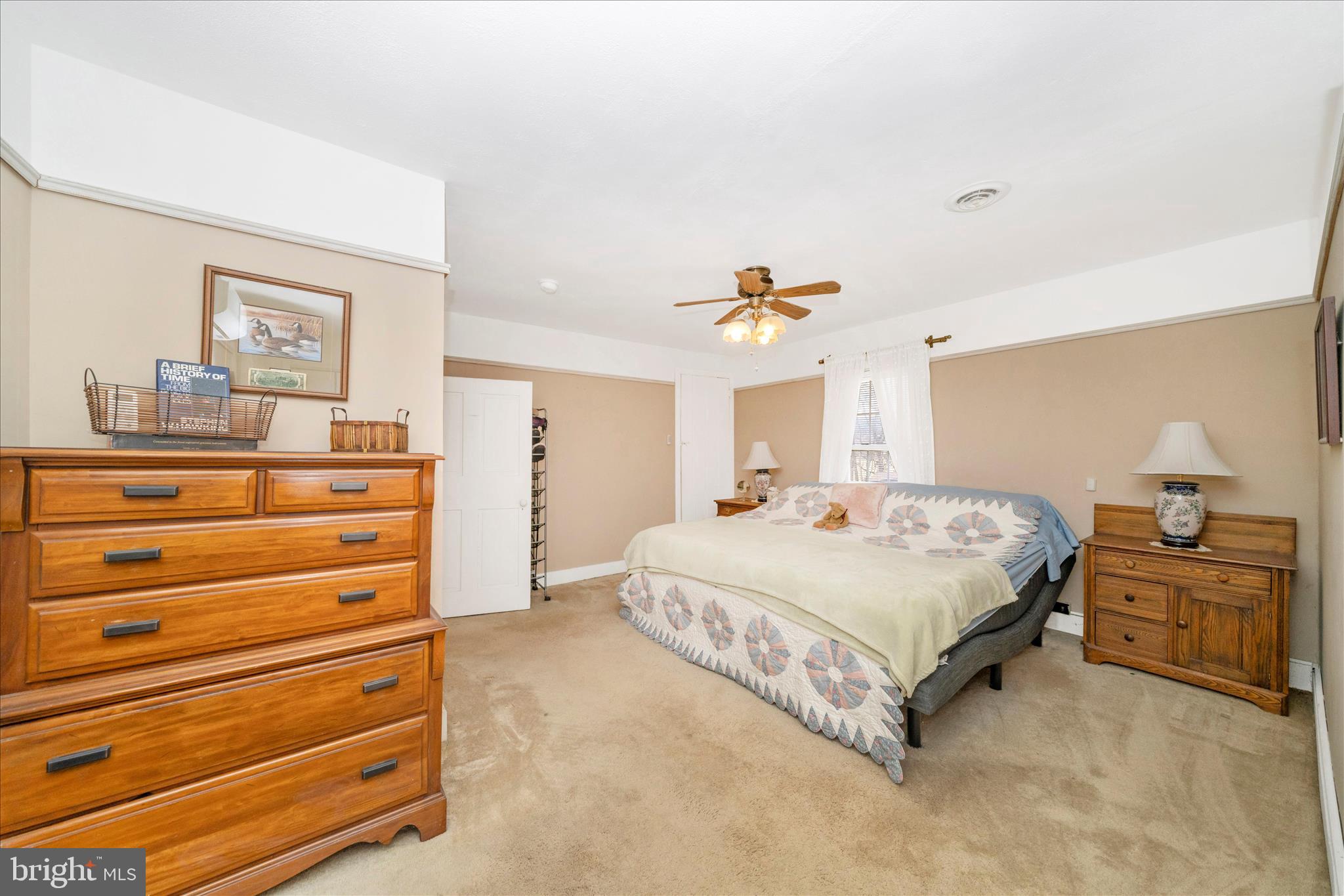 6710 Ford Road Frederick, MD 21702 - Photo 31 of 62 a spacious bedroom with a bed and a cabinets