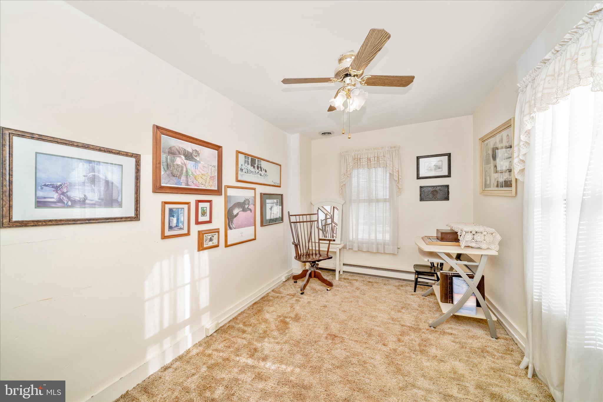 6710 Ford Road Frederick, MD 21702 - Photo 38 of 62 a view of a livingroom with workspace and a window