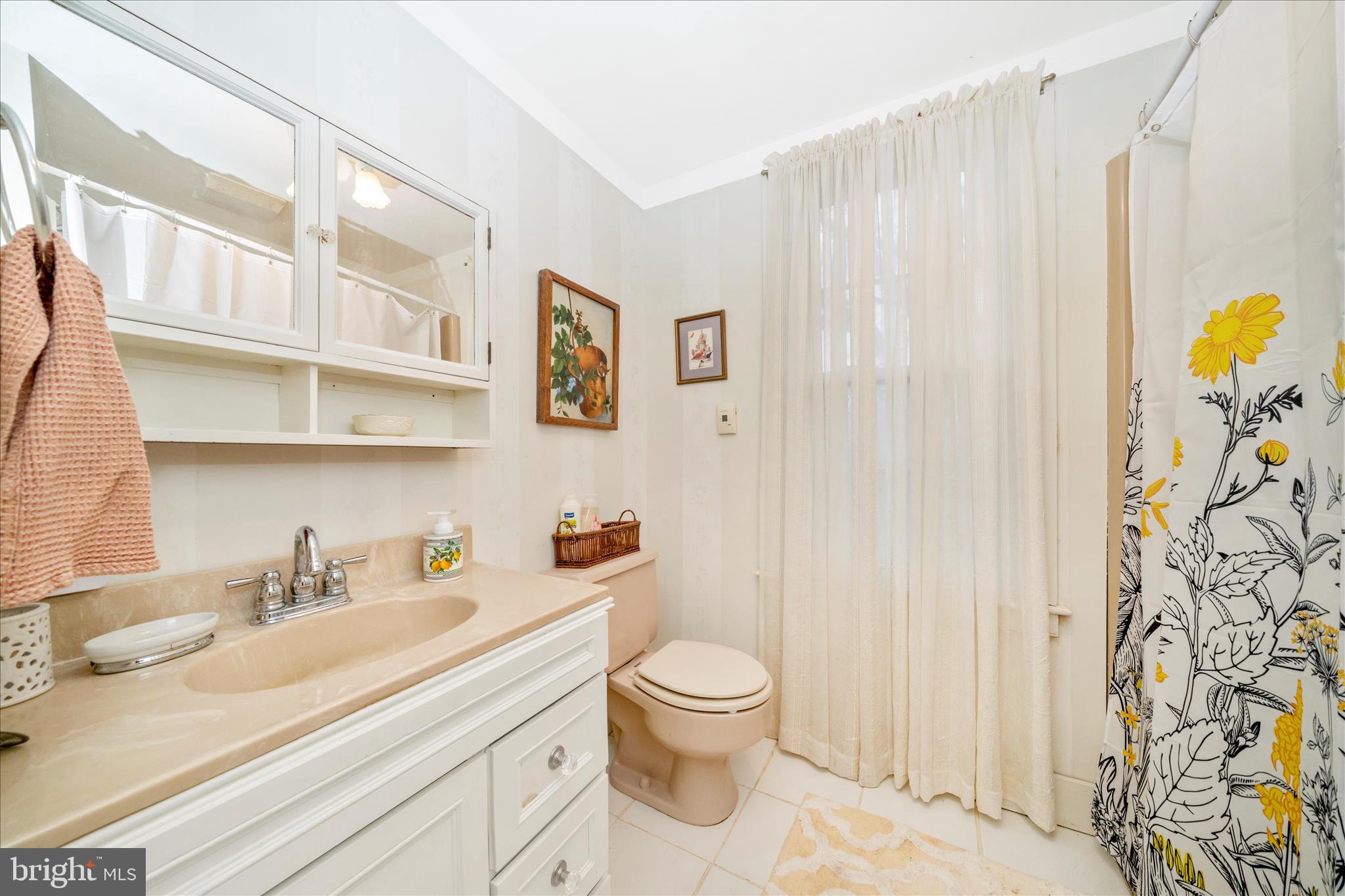 6710 Ford Road Frederick, MD 21702 - Photo 42 of 62 a bathroom with a granite countertop sink and a toilet