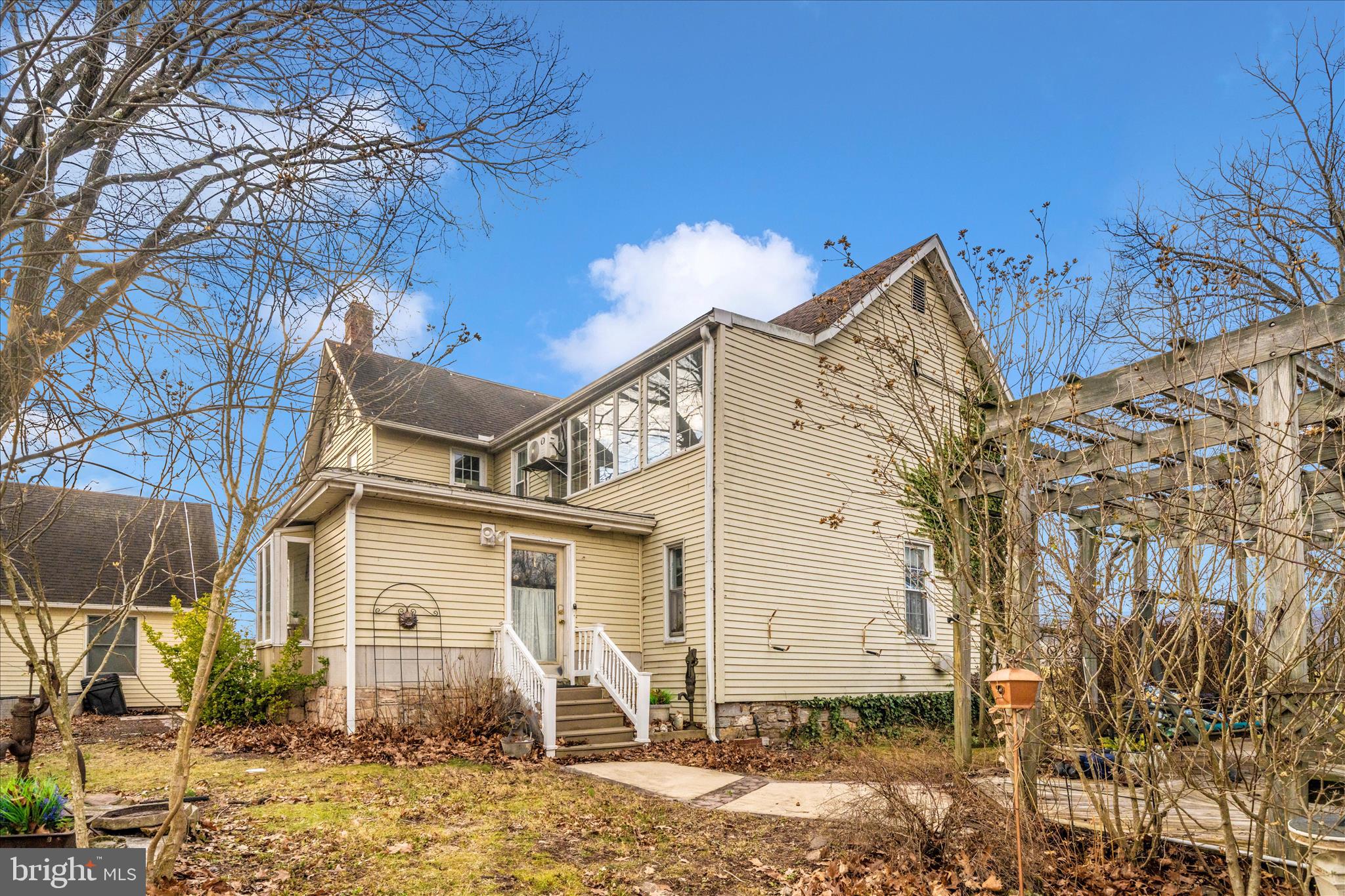 6710 Ford Road Frederick, MD 21702 - Photo 46 of 62 a view of a house with a yard