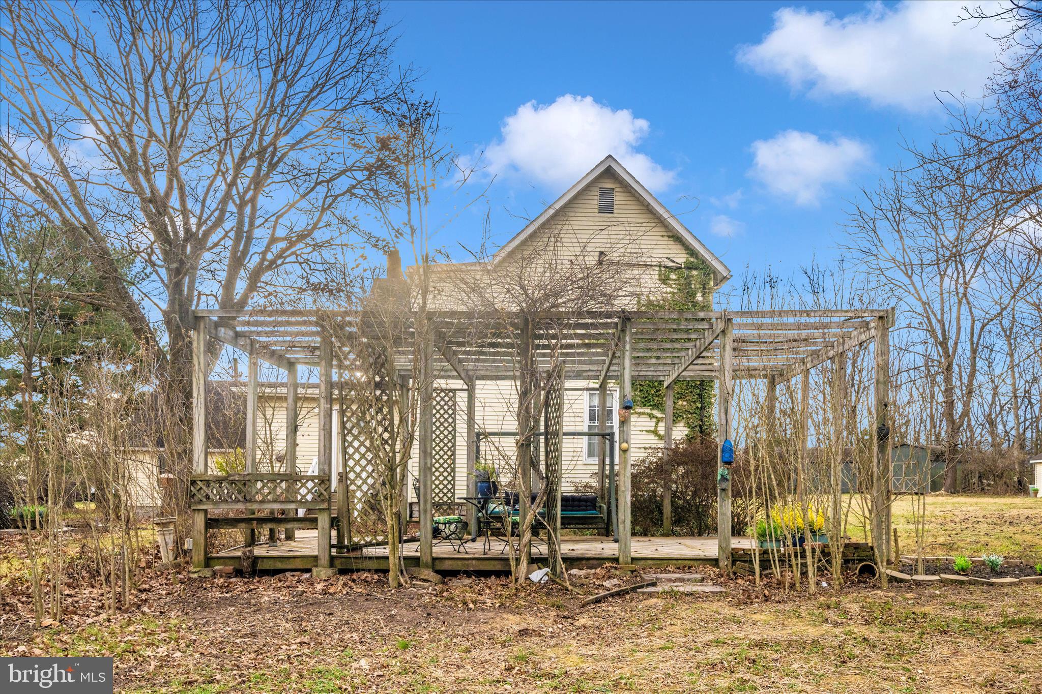 6710 Ford Road Frederick, MD 21702 - Photo 48 of 62 a view of a house with a yard patio and fire pit