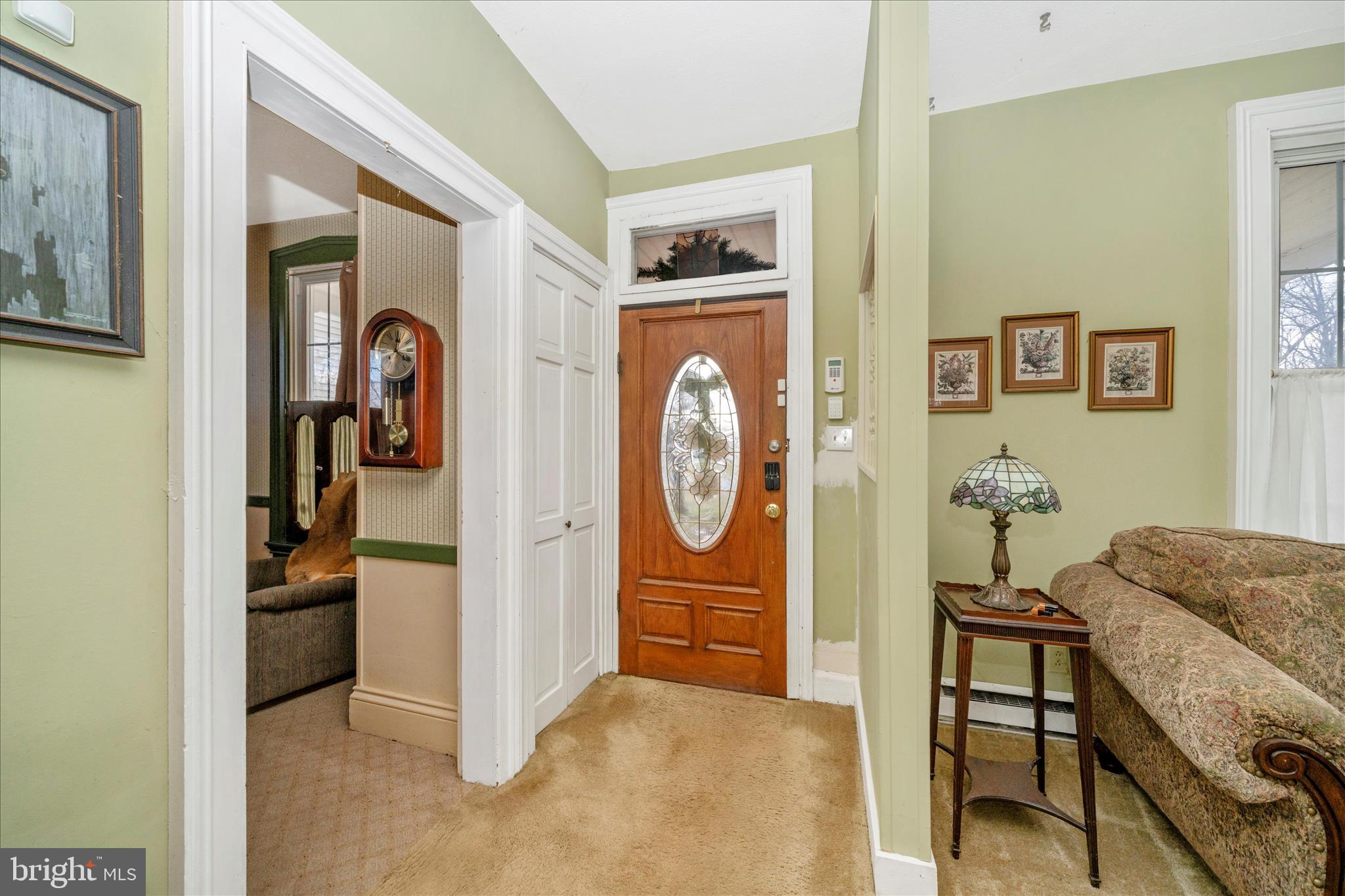 6710 Ford Road Frederick, MD 21702 - Photo 5 of 62 a bedroom with a bed and a chandelier
