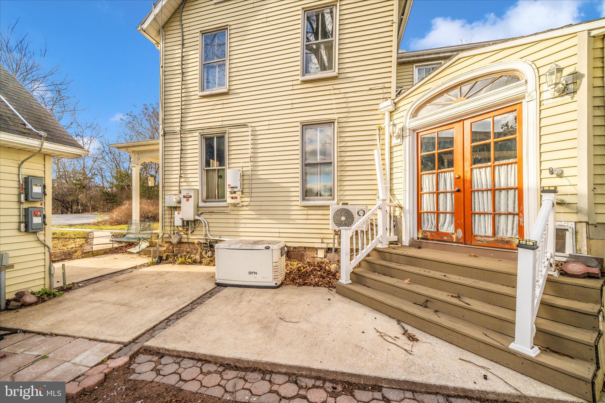 6710 Ford Road Frederick, MD 21702 - Photo 53 of 62 a view of a patio with couches and chairs with wooden floor