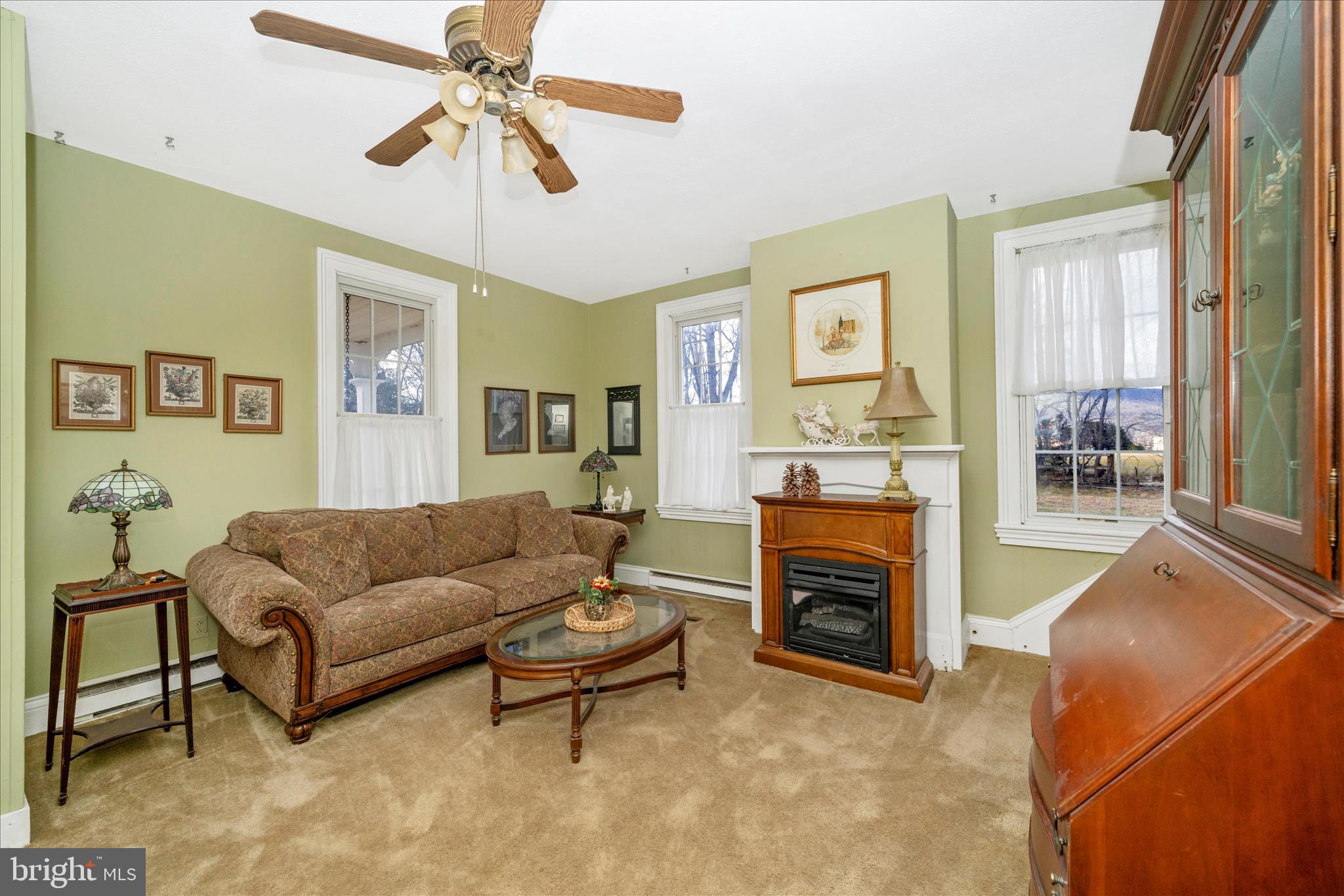 6710 Ford Road Frederick, MD 21702 - Photo 6 of 62 a living room with furniture and a fireplace