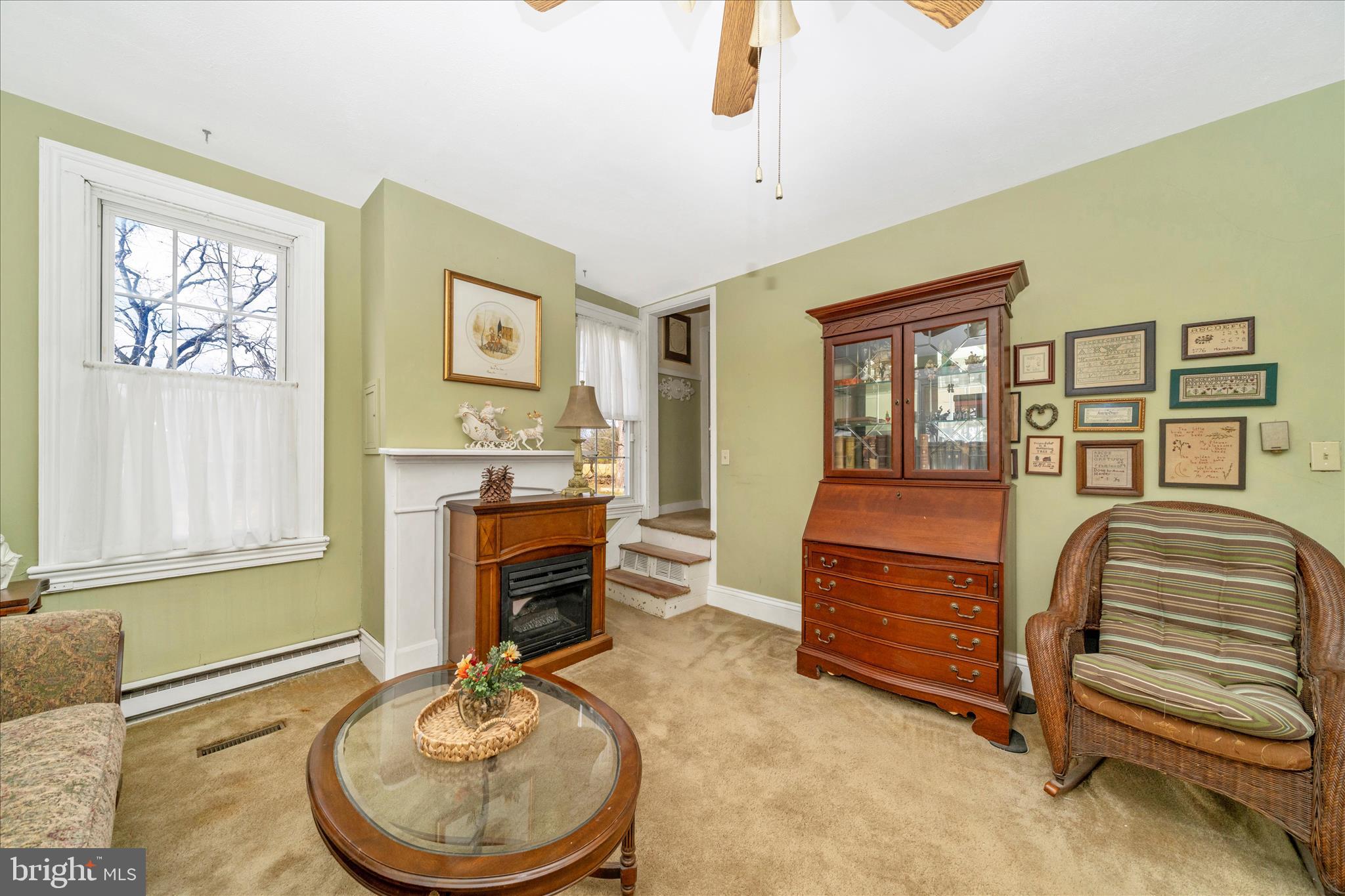 6710 Ford Road Frederick, MD 21702 - Photo 9 of 62 a bedroom with a bed and a chandelier