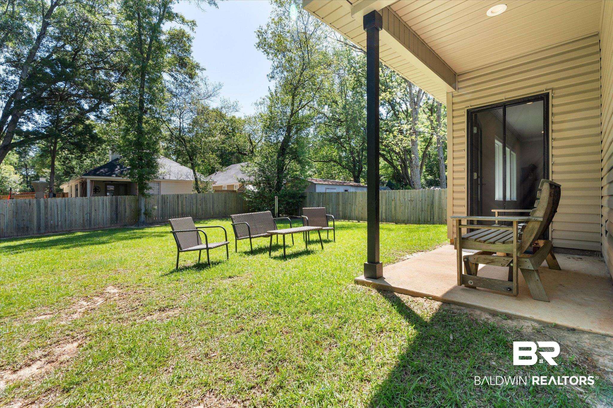1101 Pinemont Drive Mobile, AL 36609 - Photo 16 of 18 View of yard featuring a fenced backyard