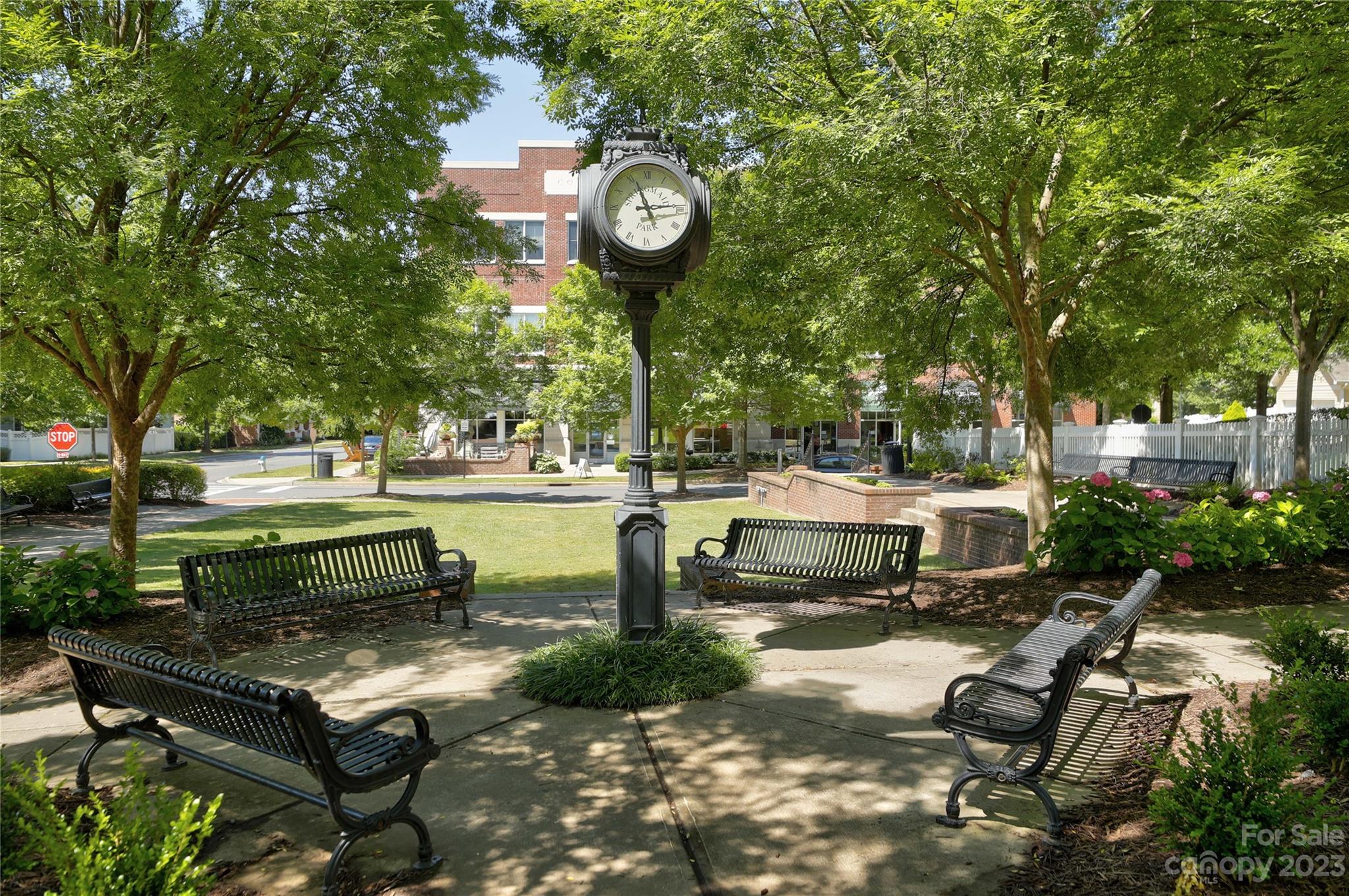 7108 Michael Scott Crossing Fort Mill, SC 29708 - Photo 3 of 24 a view of a bench in a garden