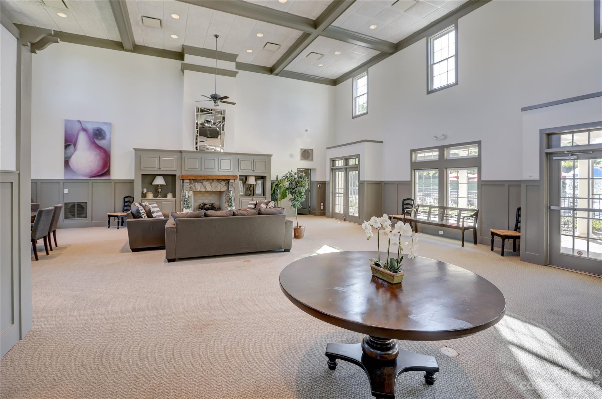 7108 Michael Scott Crossing Fort Mill, SC 29708 - Photo 9 of 24 a living room with furniture and a chandelier