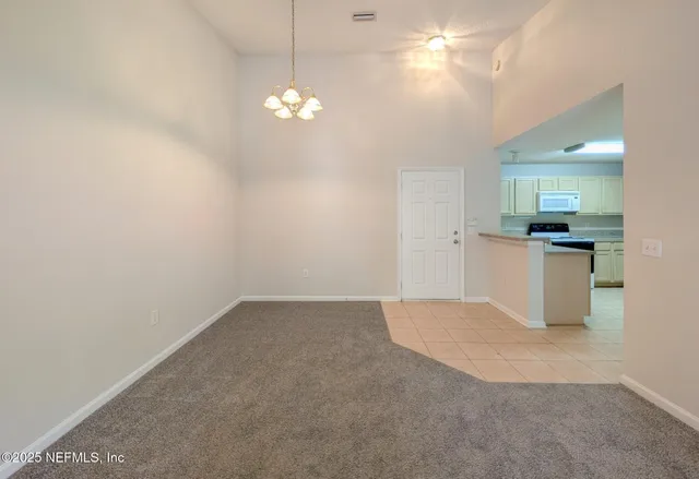 a view of a kitchen with a sink