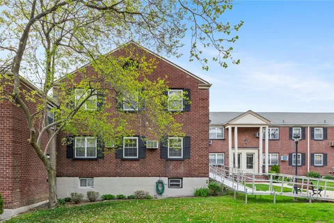 front view of house with a yard