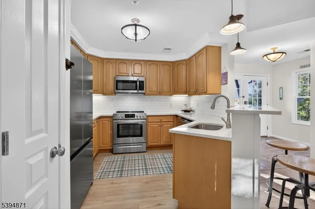 a bathroom with a granite countertop sink mirror and