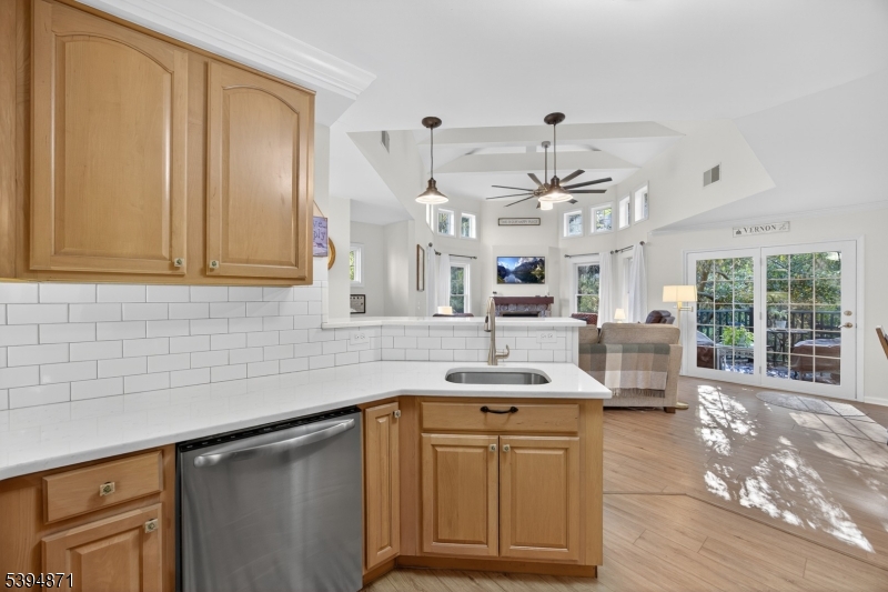 10-11 Pine Crescent, Unit 21 Vernon, NJ 07462 - Photo 21 of 50 a kitchen with a sink cabinets and window