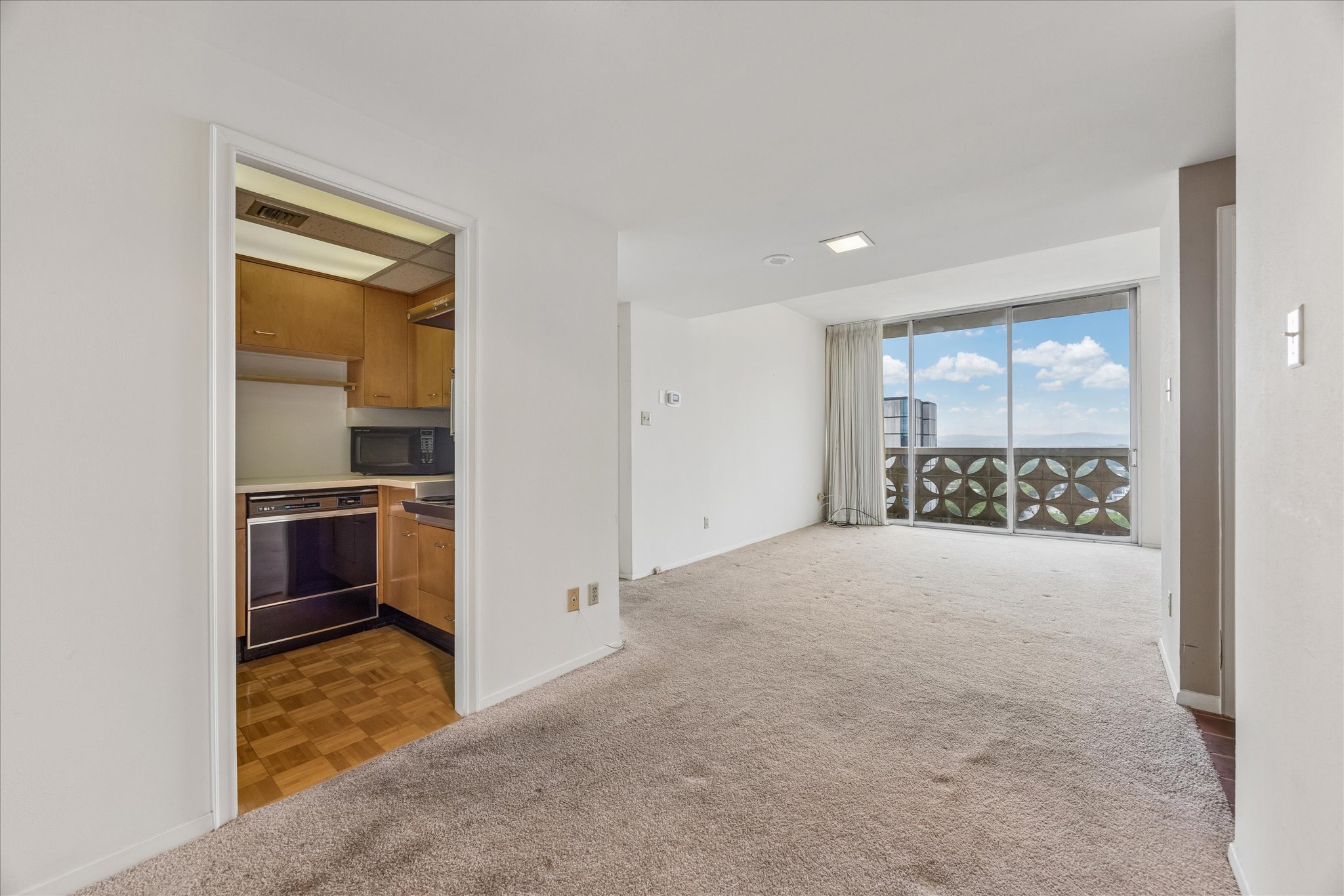 1801 Lavaca Street, Unit 14K Austin, TX 78701 - Photo 15 of 30 a view of an empty room with a window