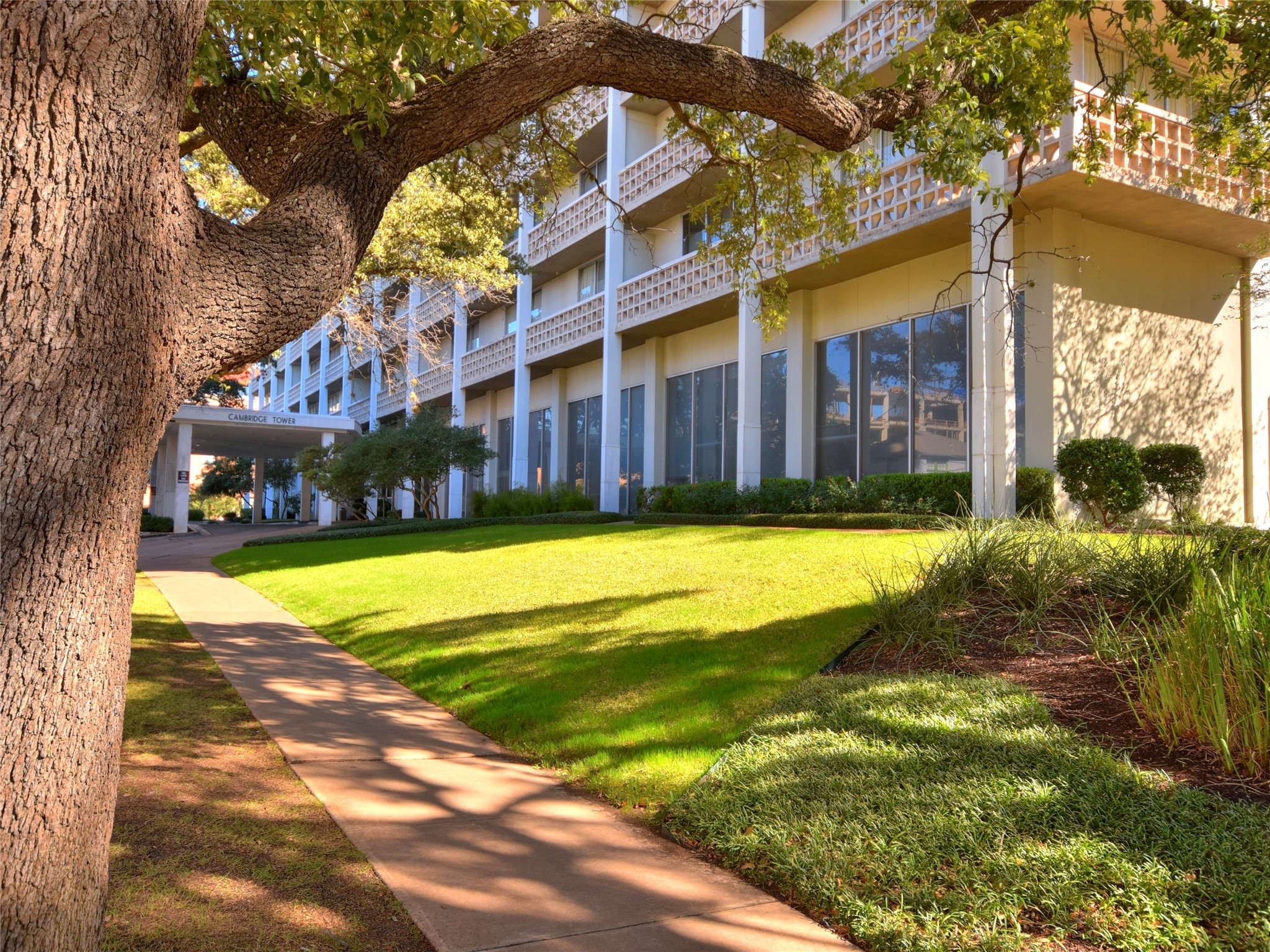 1801 Lavaca Street, Unit 14K Austin, TX 78701 - Photo 29 of 30 a view of a house with a yard