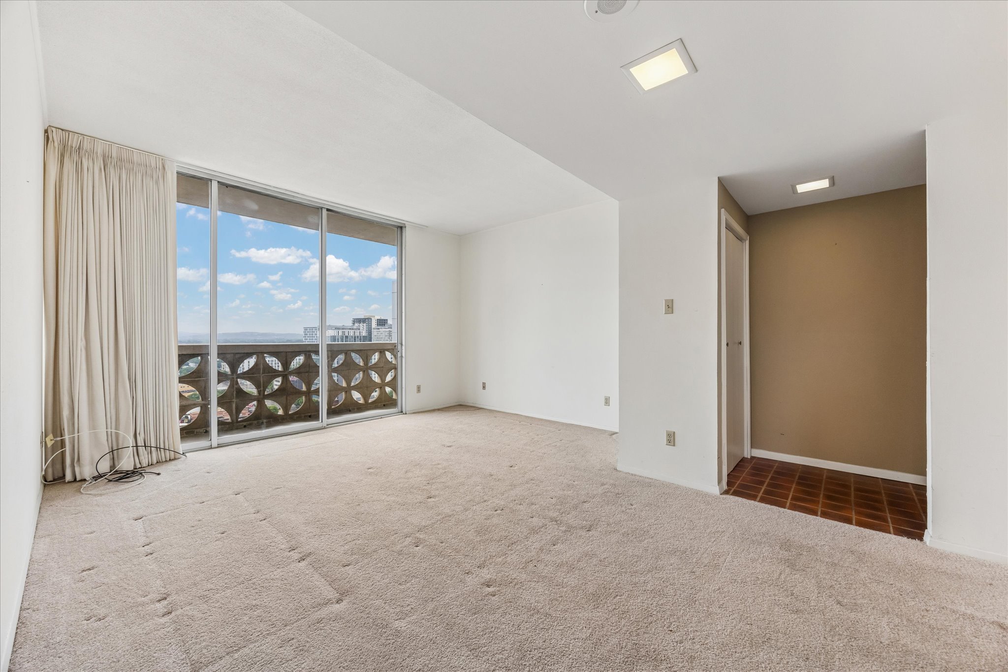 1801 Lavaca Street, Unit 14K Austin, TX 78701 - Photo 7 of 30 an empty room with large window and walk in closet