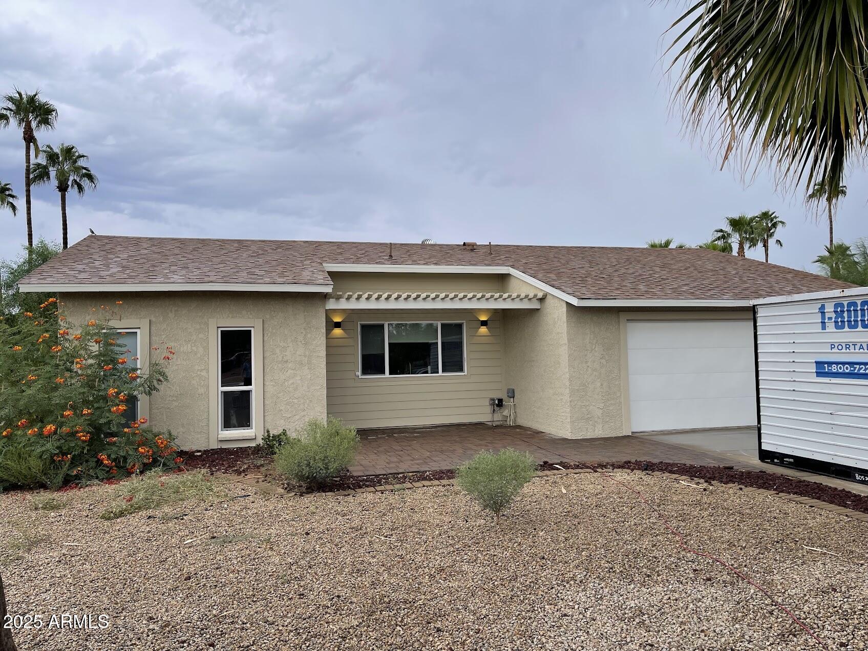 4910 East Charter Oak Road Scottsdale, AZ 85254 - Photo 2 of 2 a view of a house with a backyard