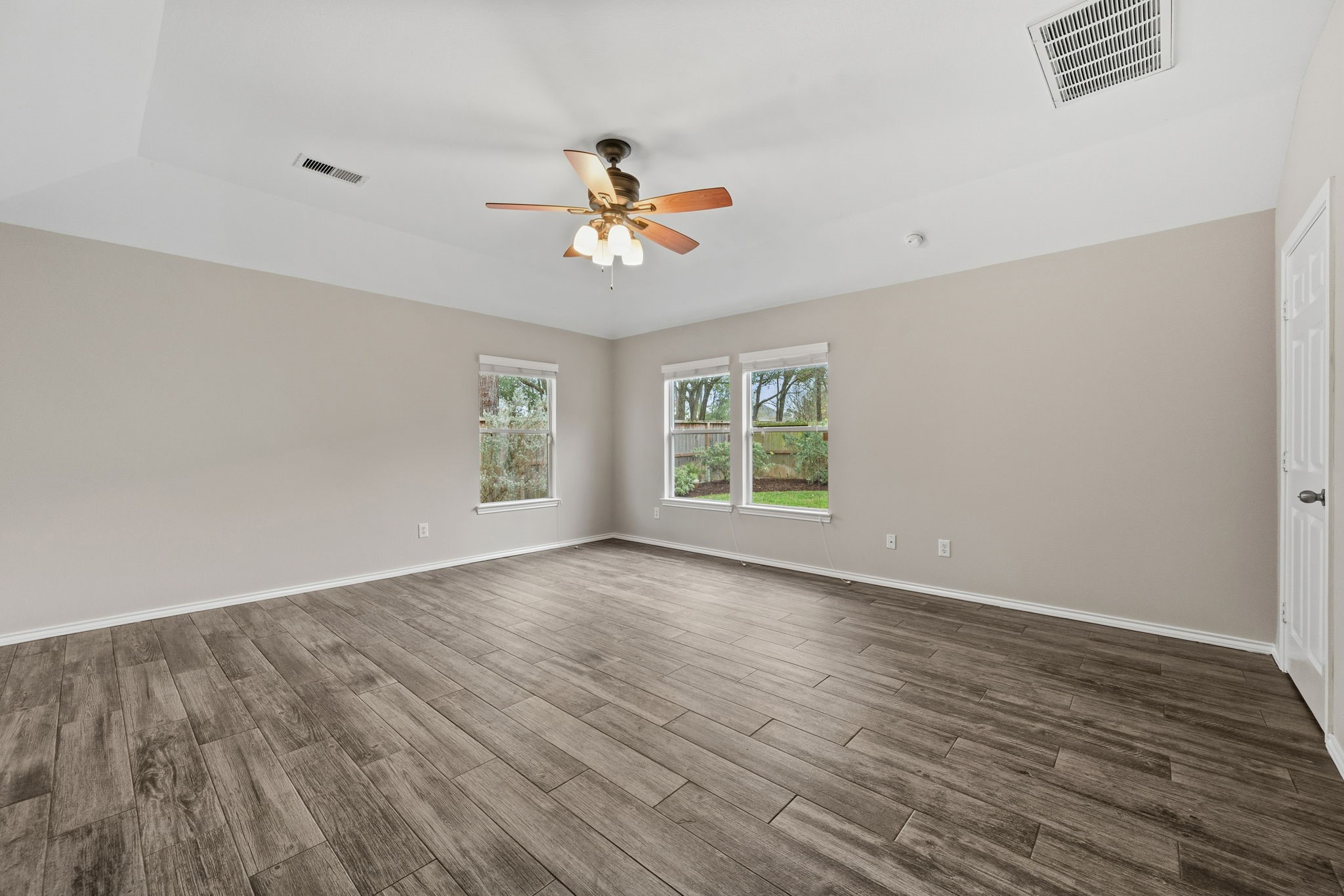 1910 Katlyn Lane Spring, TX 77386 - Photo 19 of 35 Primary bedroom overlooking the backyard.