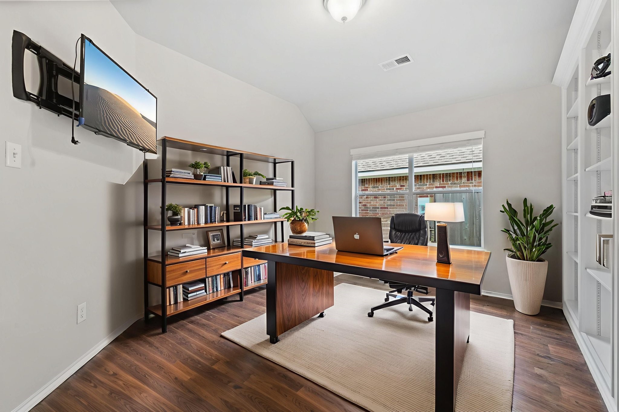 1910 Katlyn Lane Spring, TX 77386 - Photo 29 of 35 Discover your dream home office in this virtually staged space, abundant natural light, and an inviting atmosphere perfect for productivity. Built ins for great storage display.