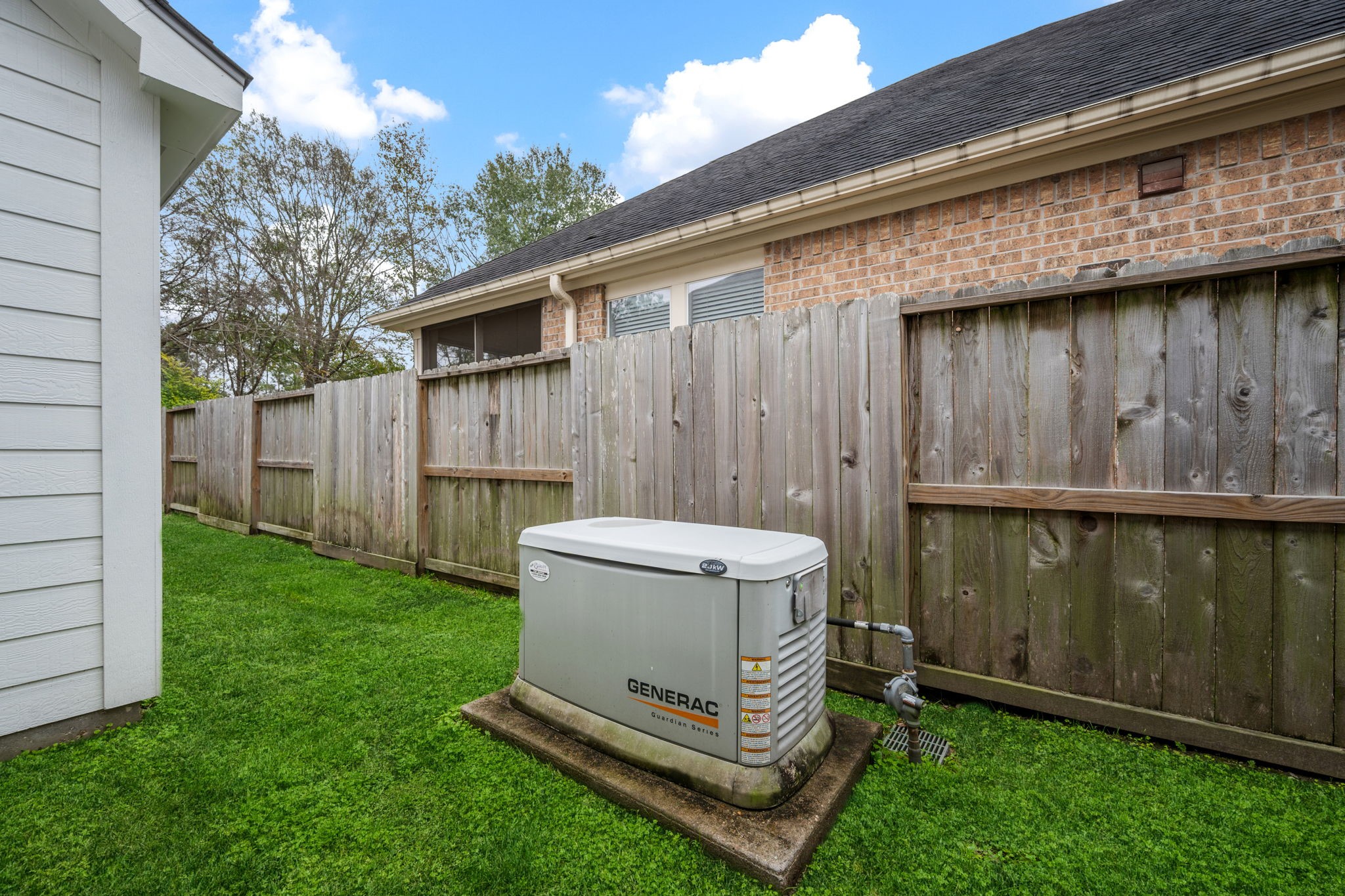 1910 Katlyn Lane Spring, TX 77386 - Photo 33 of 35 Whole house generator for those times when Houston weather becomes unpredictable. Peace of mind with this investment.