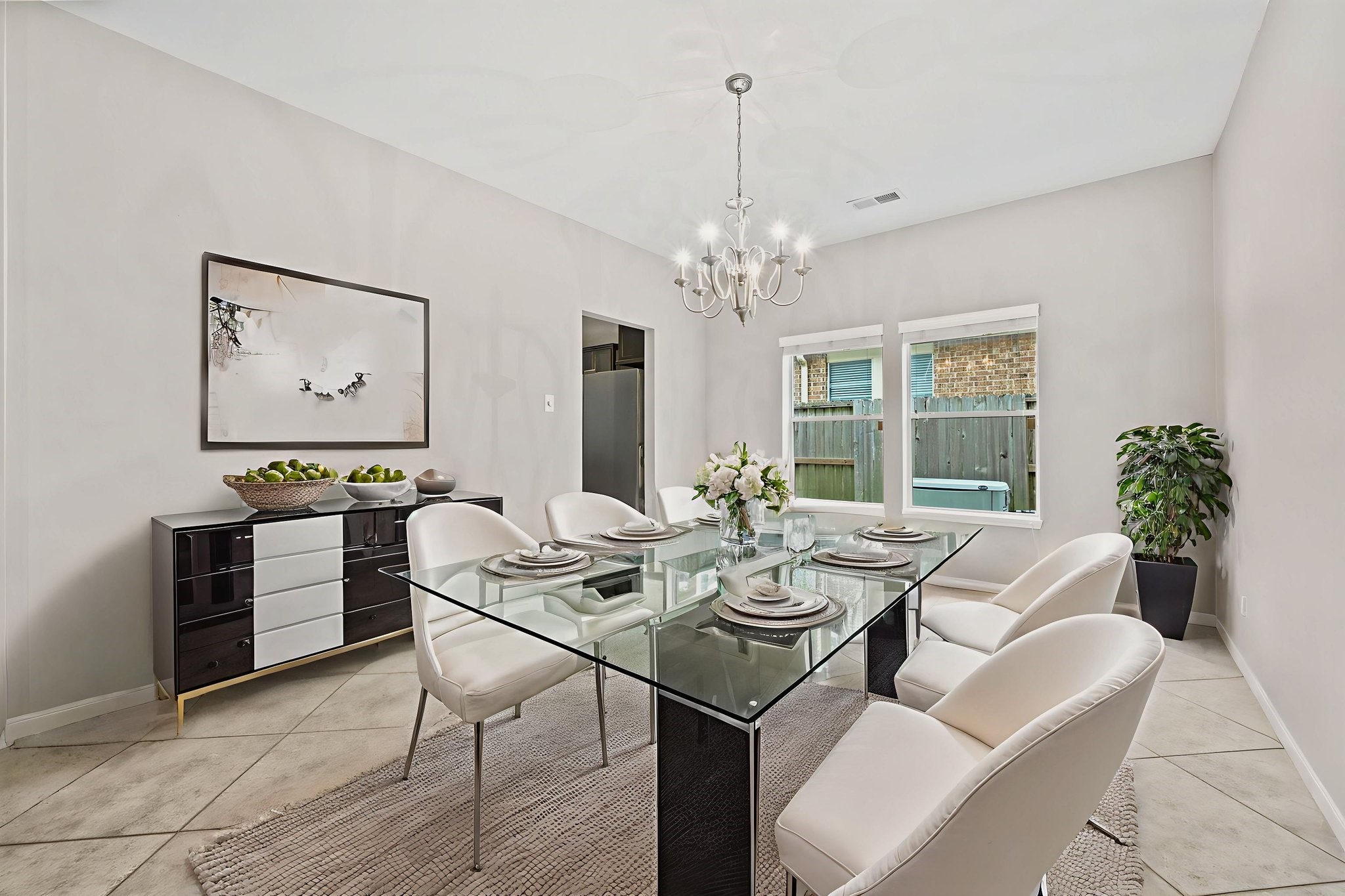1910 Katlyn Lane Spring, TX 77386 - Photo 10 of 35 Virtually Staged DINING room that has a connecting doorway to the kitchen.