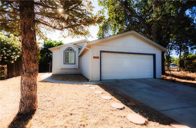 a view of house with a street