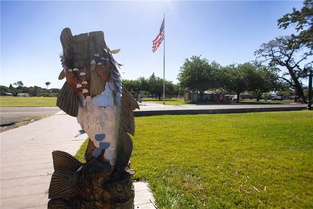 a view of a swimming pool with a lake view
