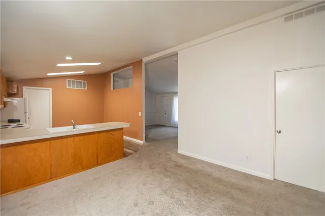 a view of a kitchen with a sink