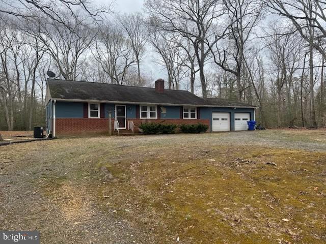 9285 Old Stagecoach Road La Plata, MD 20646 - Photo 1 of 14 a front view of a house with a yard