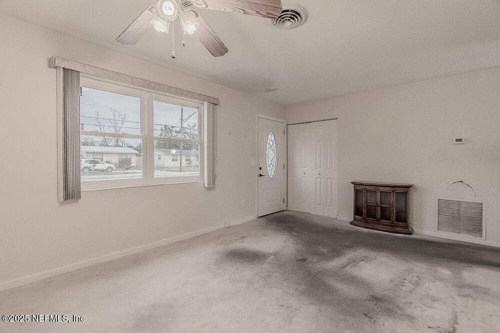 4504 Barnes Road South Jacksonville, FL 32207 - Photo 6 of 28 Living Room to Foyer