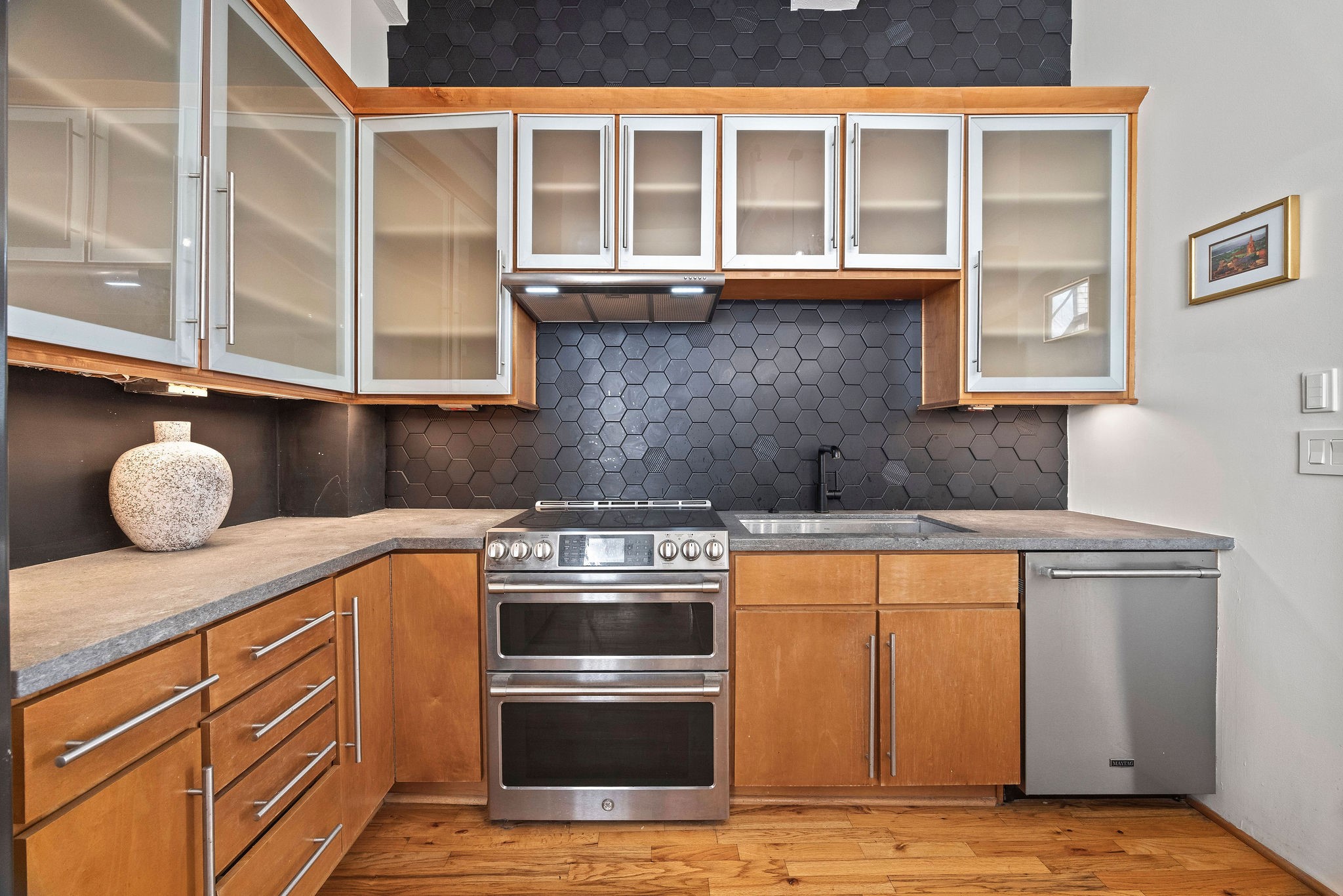 705 Main Street, Unit 516 Houston, TX 77002 - Photo 10 of 22 A kitchen that looks straight out of a luxury downtown penthouse.