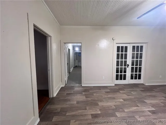 a view of empty room with windows