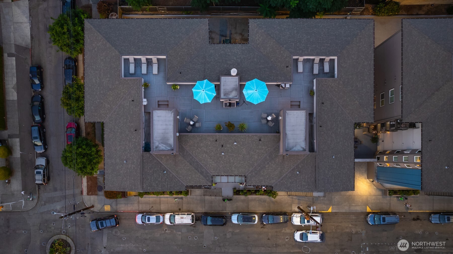 1616 Summit Avenue, Unit N203 Seattle, WA 98122 - Photo 12 of 18 an aerial view of houses with outdoor space