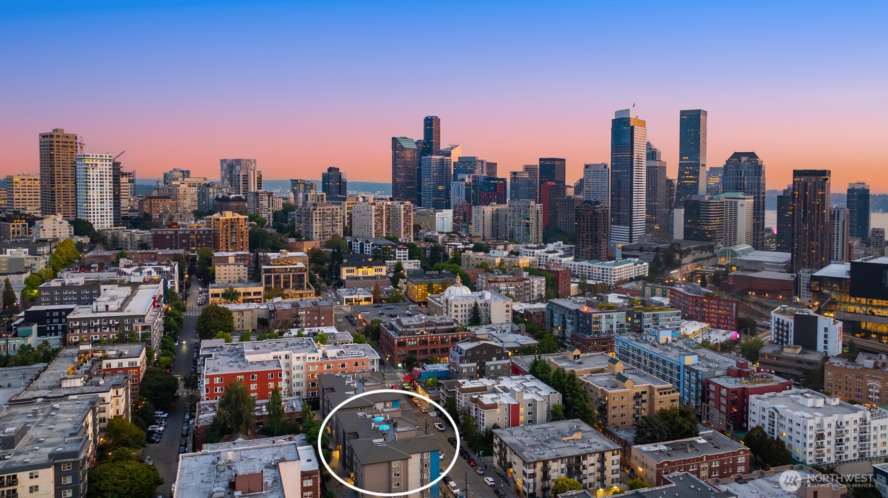 1616 Summit Avenue, Unit N203 Seattle, WA 98122 - Photo 15 of 18 a view of a city with tall buildings