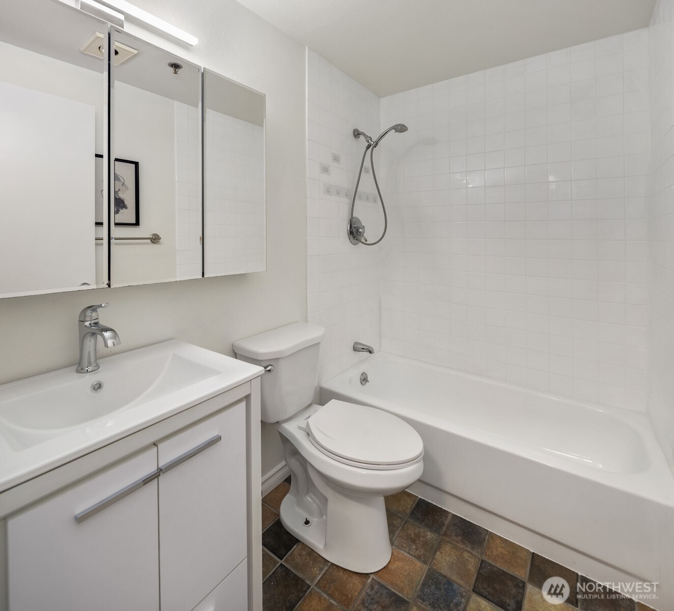 1616 Summit Avenue, Unit N203 Seattle, WA 98122 - Photo 9 of 18 a bathroom with a sink toilet and shower