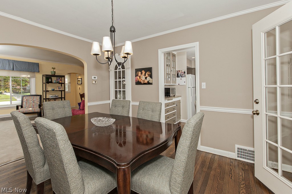 2478 Fenwick Road Cleveland, OH 44118 - Photo 4 of 22 The dining room's hardwood floor and charming built-in cabinet add style.