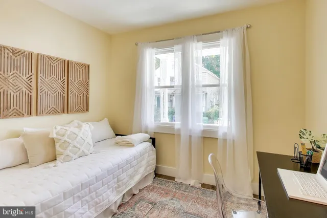 a living room with a couch and a table