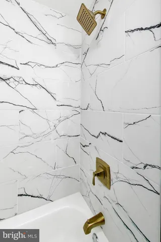 a bathroom with a bathtub