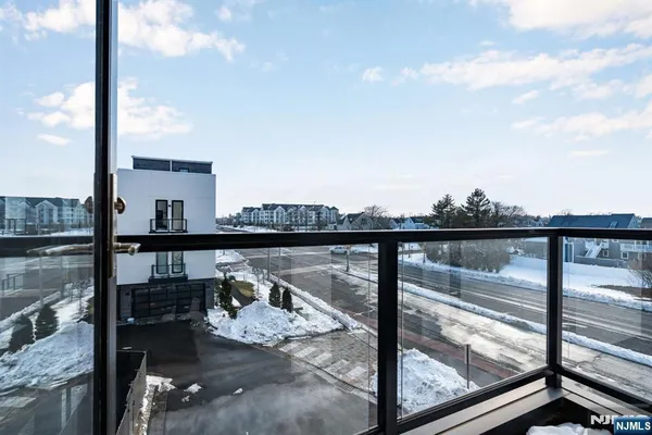 a view of a balcony with lake view