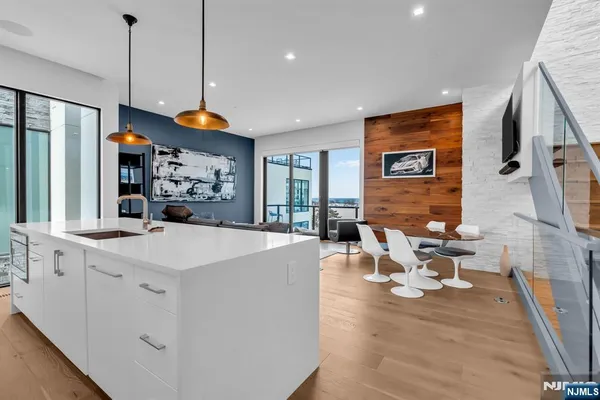 a view of living room with furniture and a window