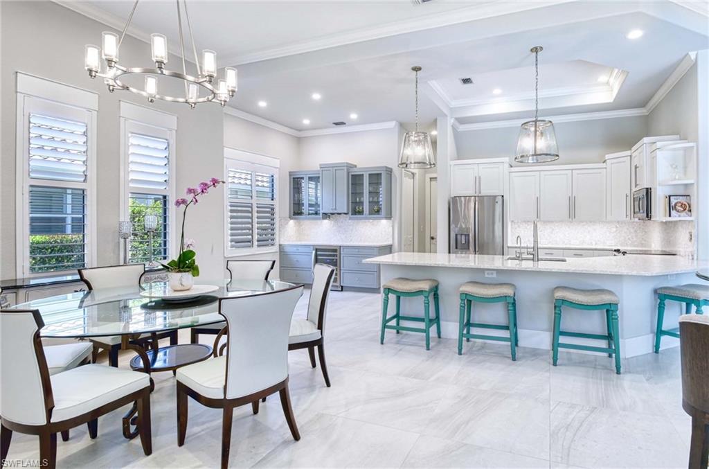 7516 Treeline Drive Naples, FL 34119 - Photo 10 of 33 a dining room with furniture and window