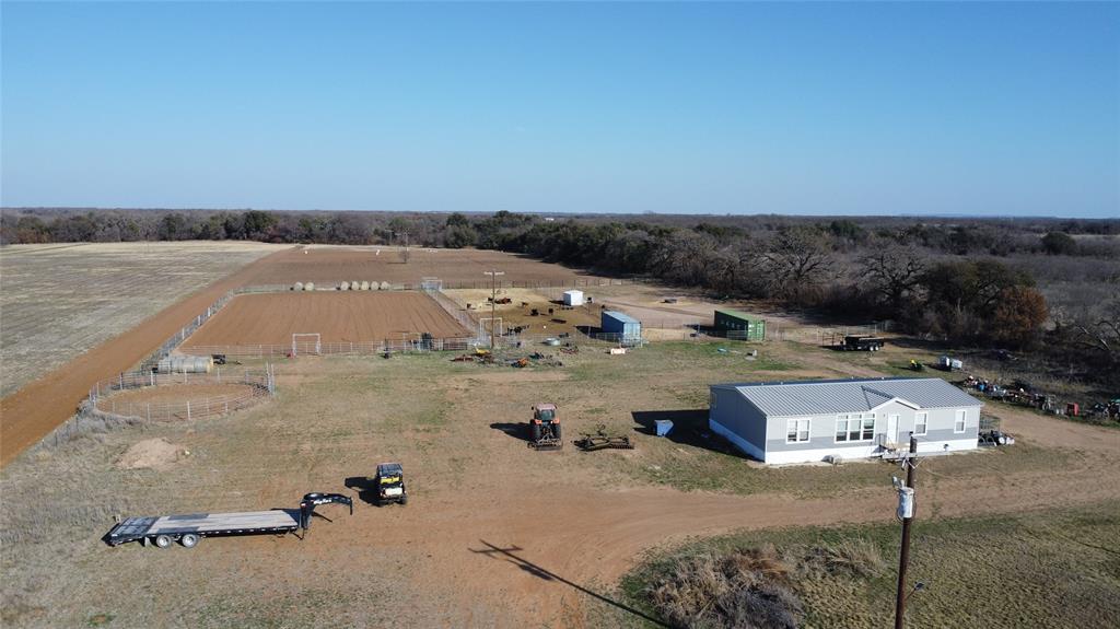 1595 Cr 131 Rising Star Tx 76471 Rising Star, TX 76471 - Photo 2 of 20 an aerial view of a house with a yard
