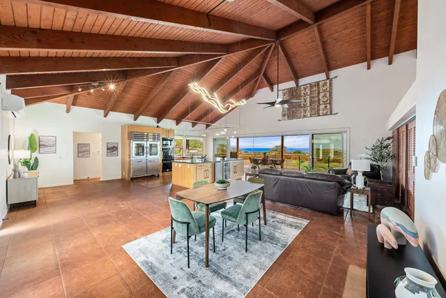 a dining room with furniture and a table
